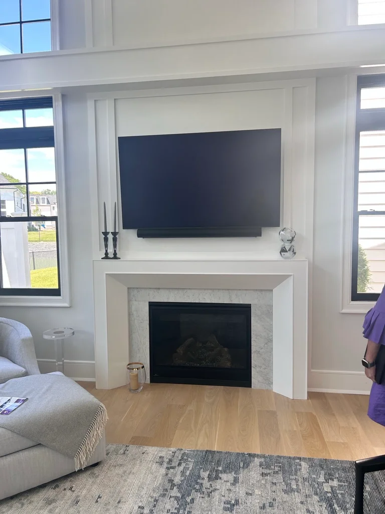 Custom fireplace mantle by Trim Master Interiors